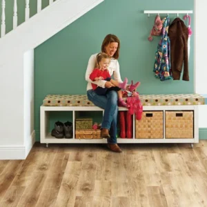 Elka Barn Oak 12mm laminate flooring shown in a room setting