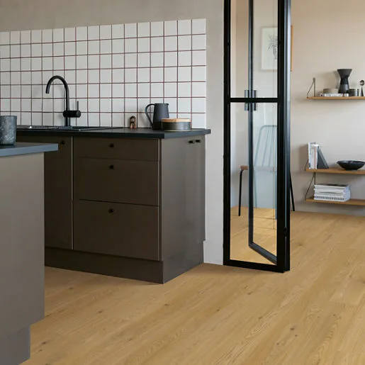 Elka Sunrise Oak 12mm laminate flooring shown in a room setting