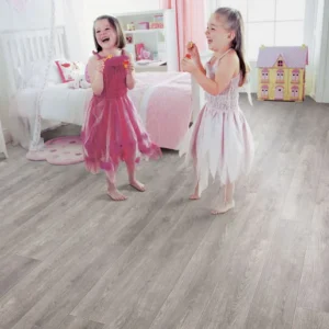 Elka Pebble Oak 8mm laminate flooring shown in a room setting