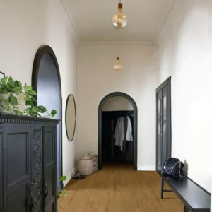 Elka Woodland Oak 8mm laminate flooring shown in a room setting