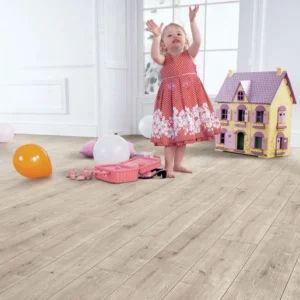 Elka Driftwood Oak 8mm laminate flooring shown in a room setting